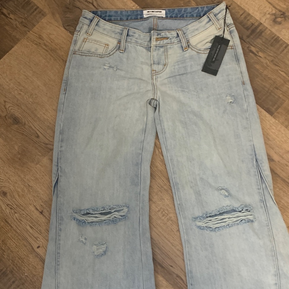 Distressed Light Blue Wide Leg Jeans -